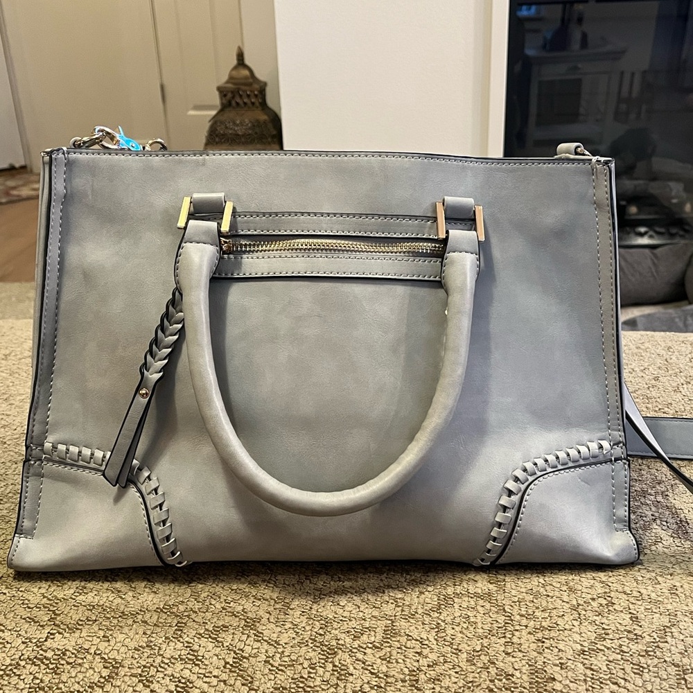 Grey pleather purse.